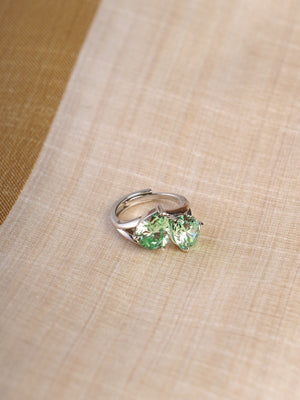 Sitamani mint green twin-stone contemporary statement ring shown on hand with polished silver-tone band