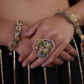 Sitamahor navrangi mixed-metal statement ring with layered floral medallions, pearl edging and red green enamel-style accents