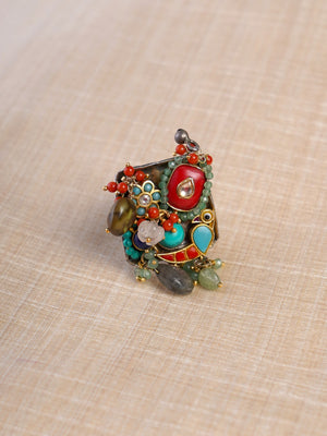 Sitamahor navrangi multicolour artisan fusion statement ring shown on hand with turquoise, coral and green stone accents