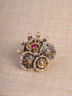 Sitamohur pearl peacock medallion dual-tone fusion statement ring shown on hand with layered silver-gold motifs and magenta accent