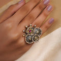 Sitamohur peacock medallion dual-tone fusion statement ring with pearl edging, oxidized silver, antique gold and magenta accents