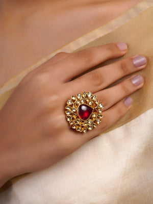 Samraagni ruby teardrop kundan jadau floral statement ring with deep red centre stone, white kundan-style halo and antique gold finish