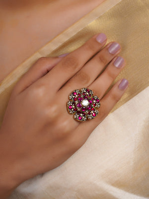 Samragni ruby bloom kundan jadau floral statement ring with layered ruby-red petals, white stones and antique gold finish