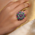 Samragni oxidized kundan floral statement ring with ruby-pink and emerald-green teardrop stones, white accents and silver-tone finish