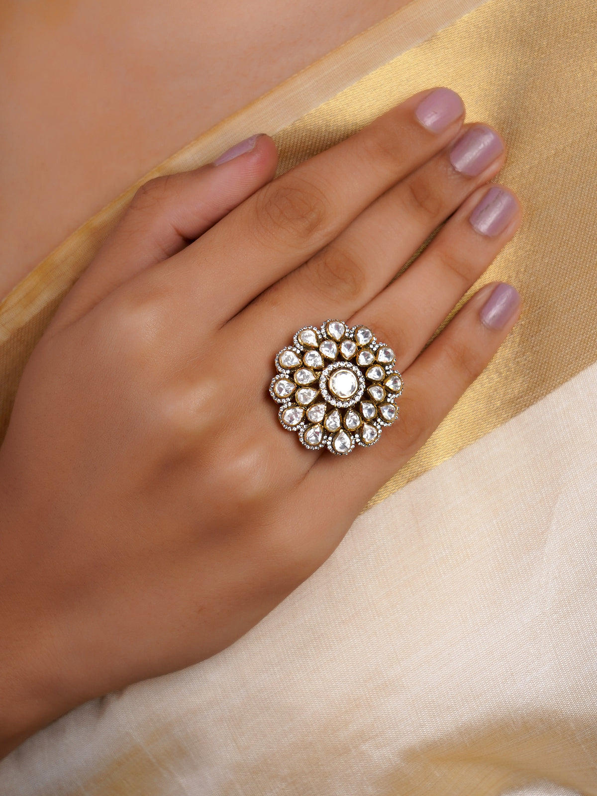 Sitaratna white moissanite floral halo statement ring with round clear centre and layered pear-shaped sparkling white stones