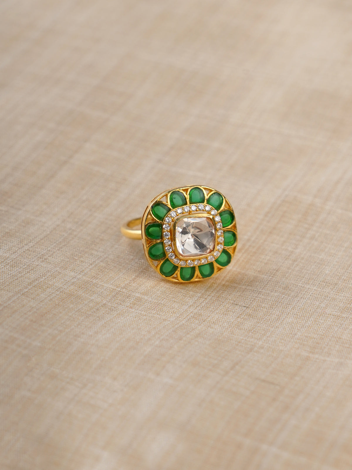 Sitaratna green and white halo moissanite ring styled on hand