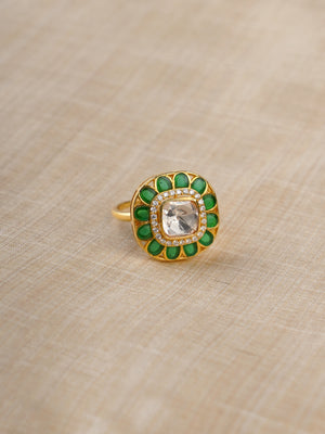 Sitaratna green and white halo moissanite ring styled on hand