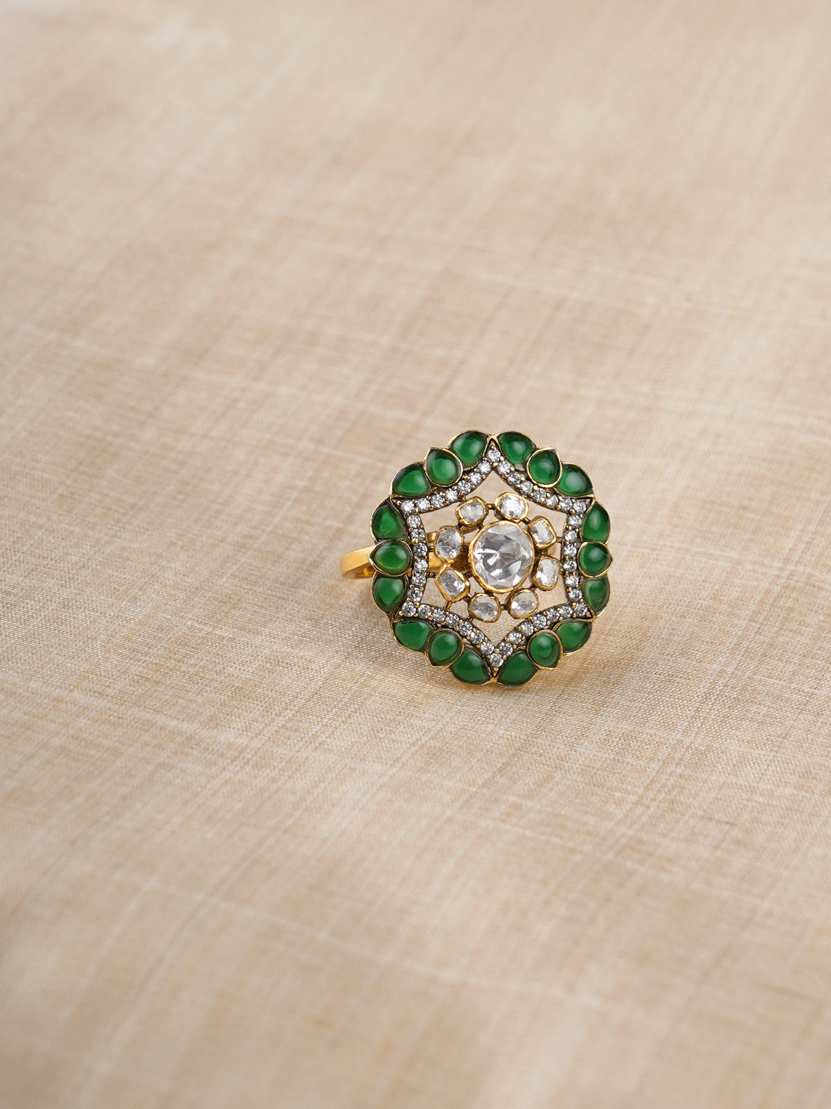 Sitaratna green and white geometric moissanite ring styled on hand
