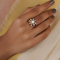 Sitaratna emerald centre moissanite scroll statement ring handcrafted in 925 sterling silver
