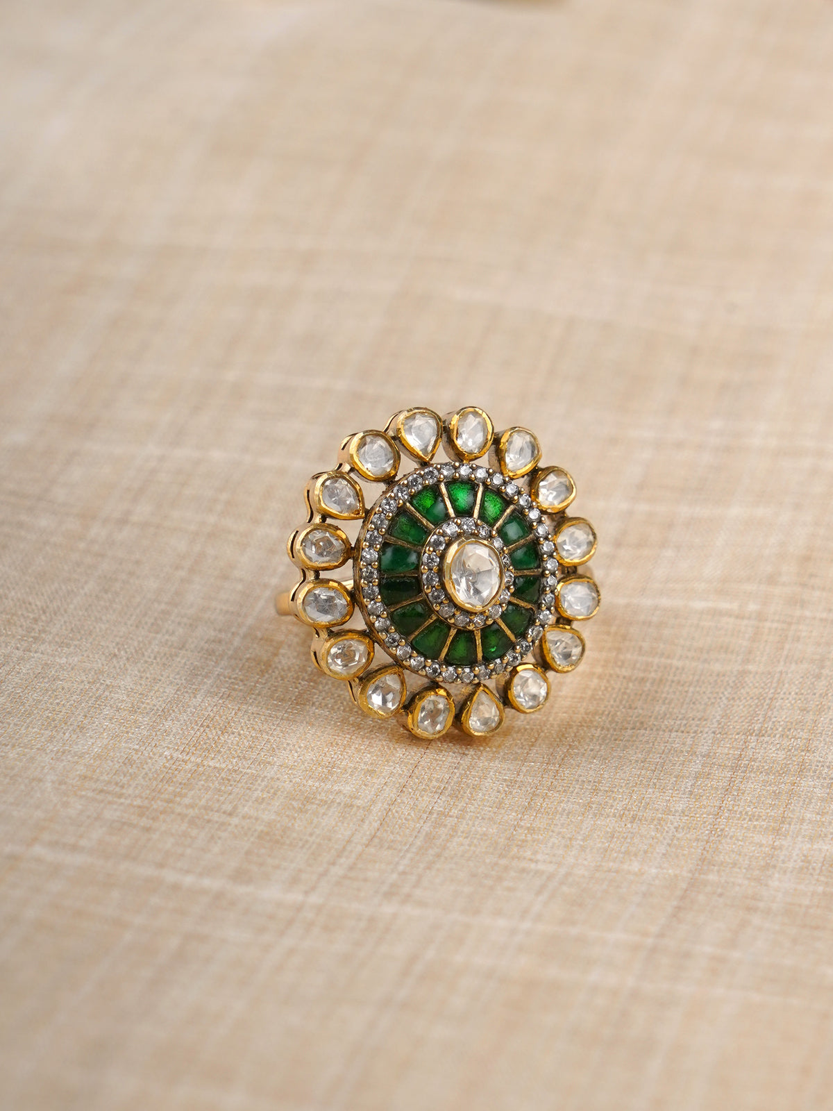 Sitaratna green and white radial moissanite ring styled on hand