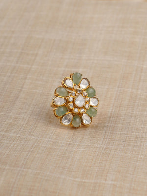 Sitaratna sage green and white moissanite floral ring styled on hand