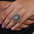 Sitavan oxidised silver heritage ring with round layered floral medallion and sculpted petal detailing