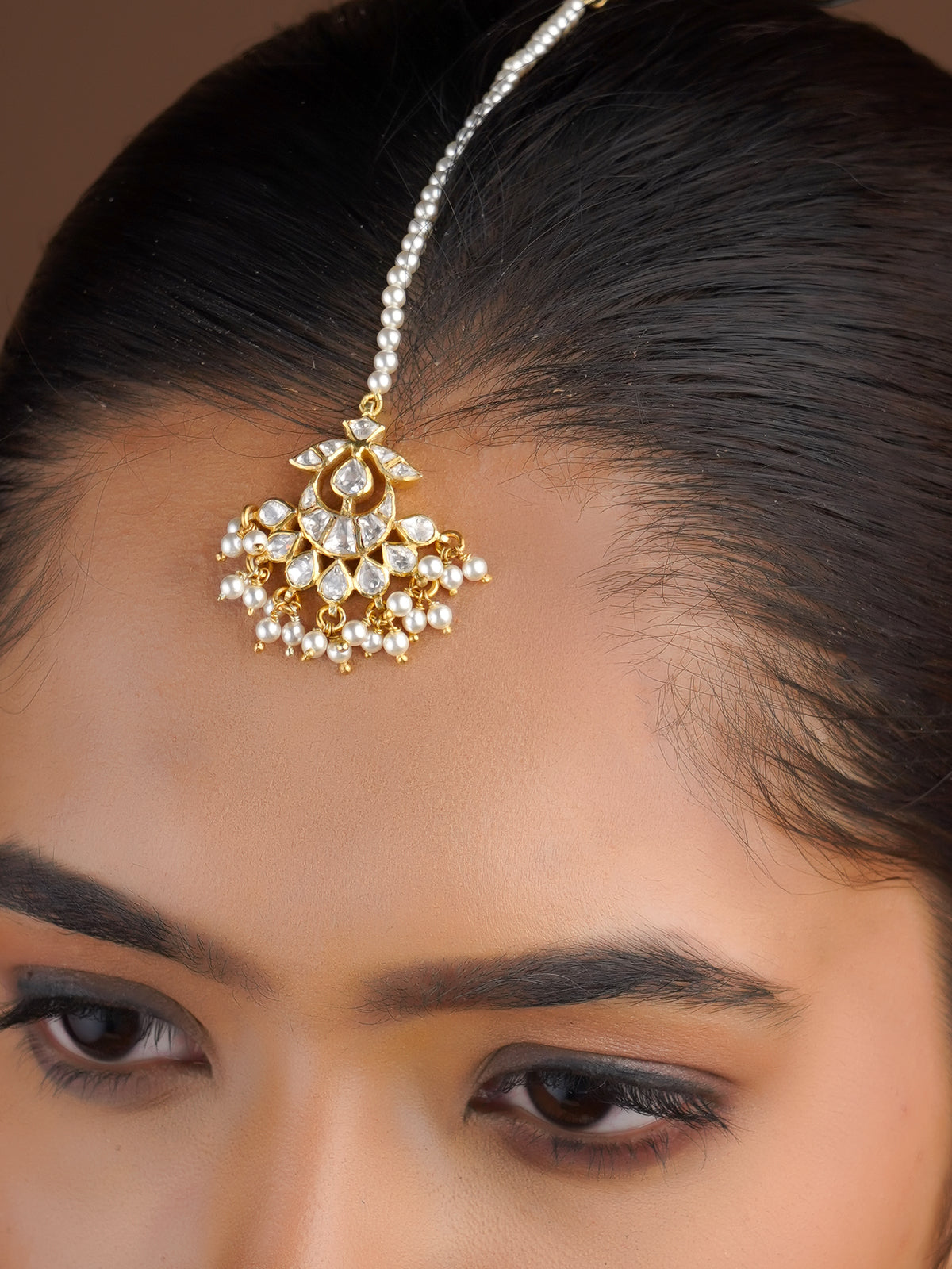 Sitaratna pearl fringe moissanite maang tikka styled on model