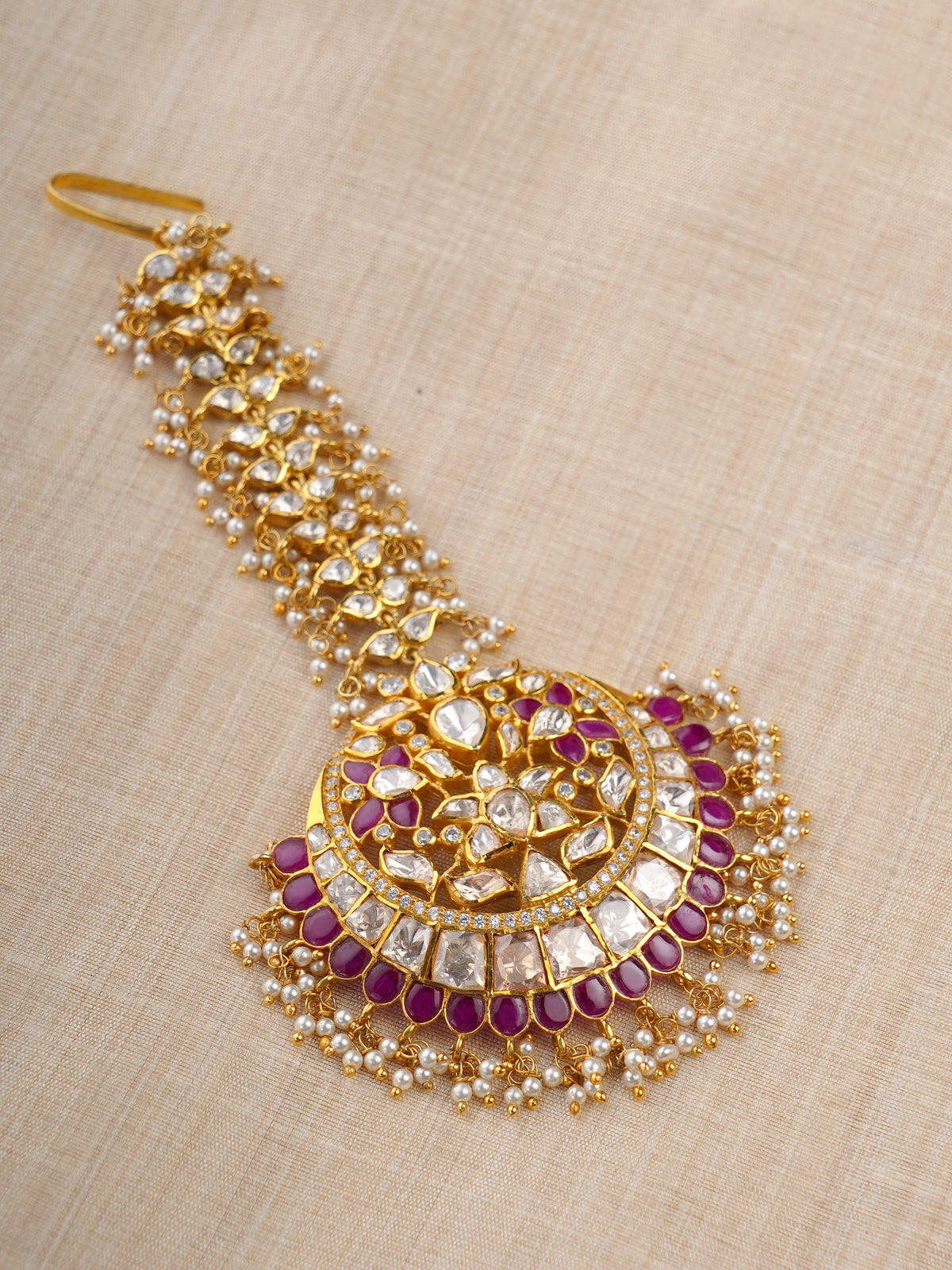 Sitaratna magenta and white moissanite maang tikka styled on model